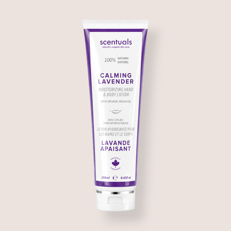 A squeeze tube of scentsuals Calming Lavender Moisturizing Hand & Body Lotion on a solid light beige background.