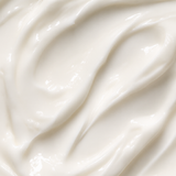 A close-up texture shot of a thick, creamy off-white cosmetic cream with smooth, glossy swirls.